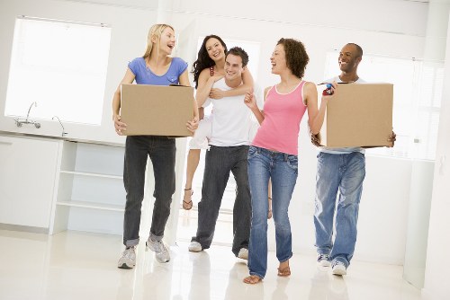 Man and van removals service in Lisson Grove with a moving van on a residential street