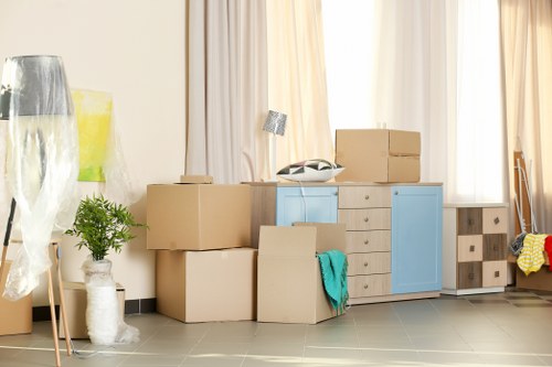 Removal team planning a move in Lisson Grove on a busy residential street
