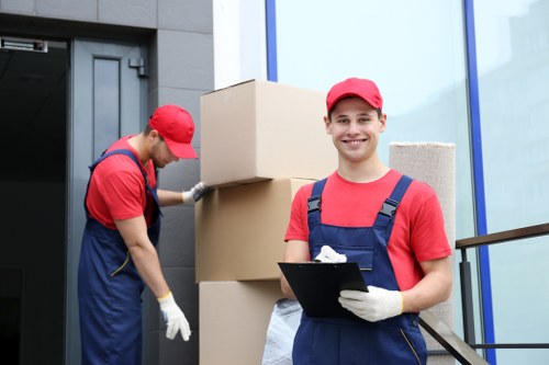 Moving van with recyclable boxes and sorted materials