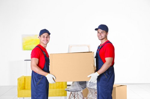 Removal team preparing a move in a Lisson Grove residential street
