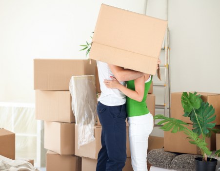 Moving furniture from a flat near central London streets
