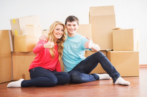Boxes and fragile items prepared for transport by removals crew