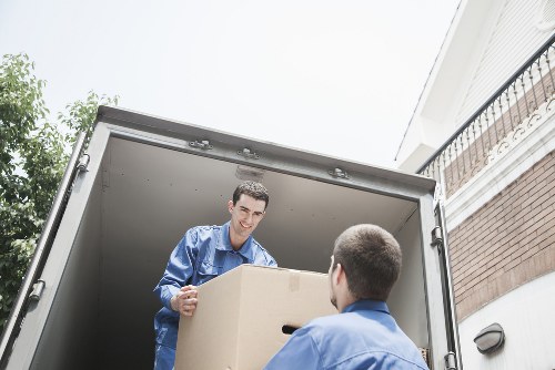 Office desks, boxes, and filing items ready for commercial relocation